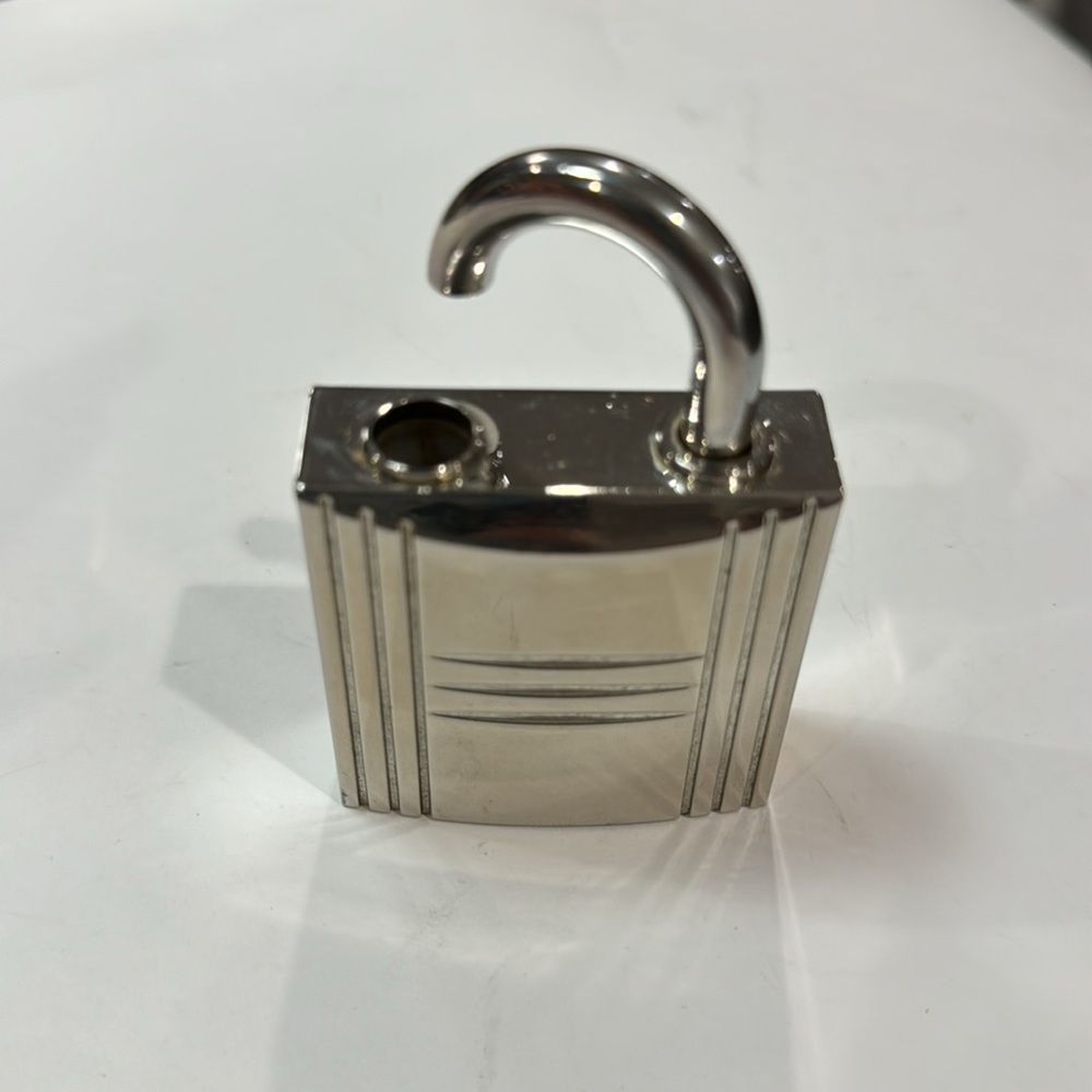 Hermes Authentic Pre Loved Kelly Caleche Padlock Refillable Parfum atomizer.